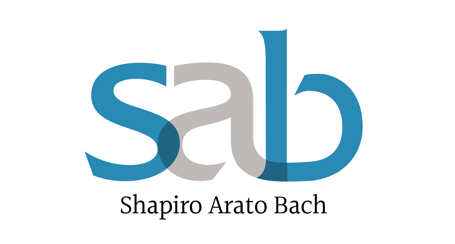 Shapiro Arato Bach logo designed by DLS Design is an extension of an earlier logo with two initials.